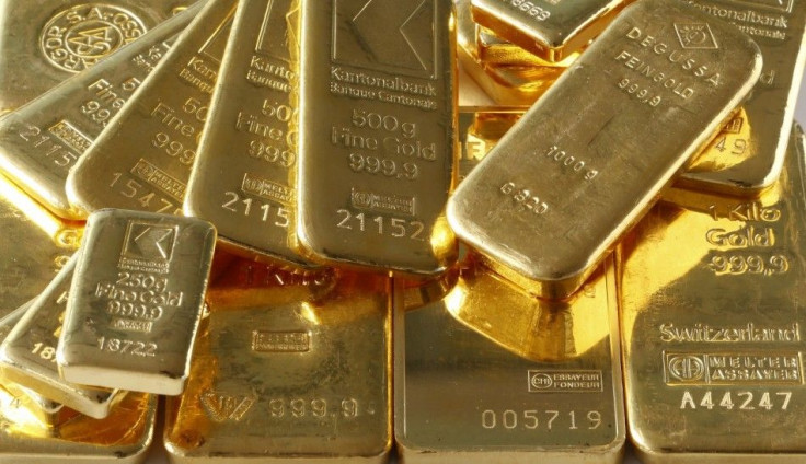 Gold bars from the vault of a bank are seen in this illustration picture taken in Zurich November 20, 2014. The &quot;Save our Swiss gold&quot; proposal, spearheaded by the right-wing Swiss People&#039;s Party (SVP), aims to ban the central bank from offl