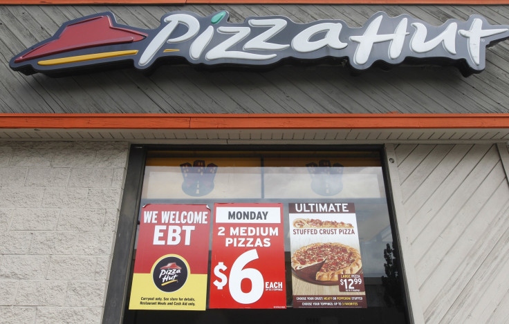 A Pizza Hut restaurant is pictured in Burbank, California April 19, 2011. Taco Bell is part of Yum! Brands, the world's largest company of system restaurants, including Pizza Hut, Taco Bell, and KFC. Yum! Brands will release its earnings on April 20.