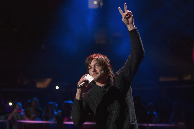 Actor Norman Reedus introduces an act during the 2013 Z100 Jingle Ball in New York December 13, 2013. 