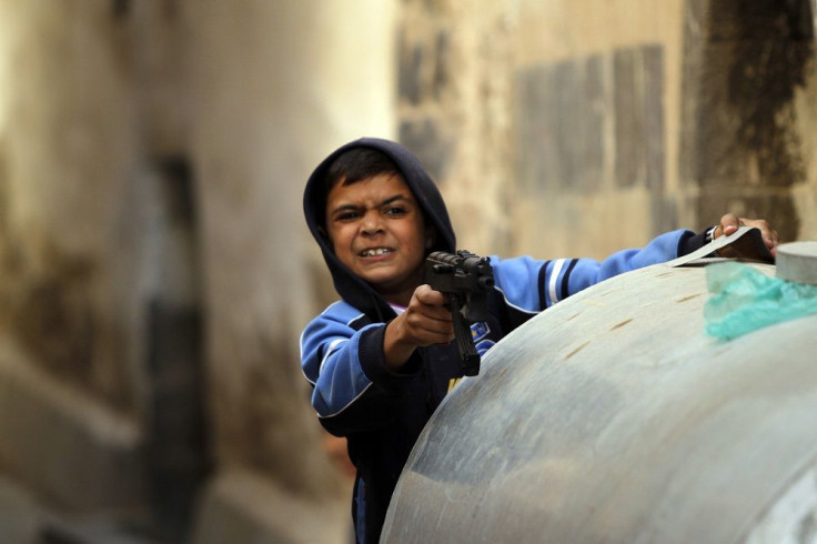 Boy Playing with Gun