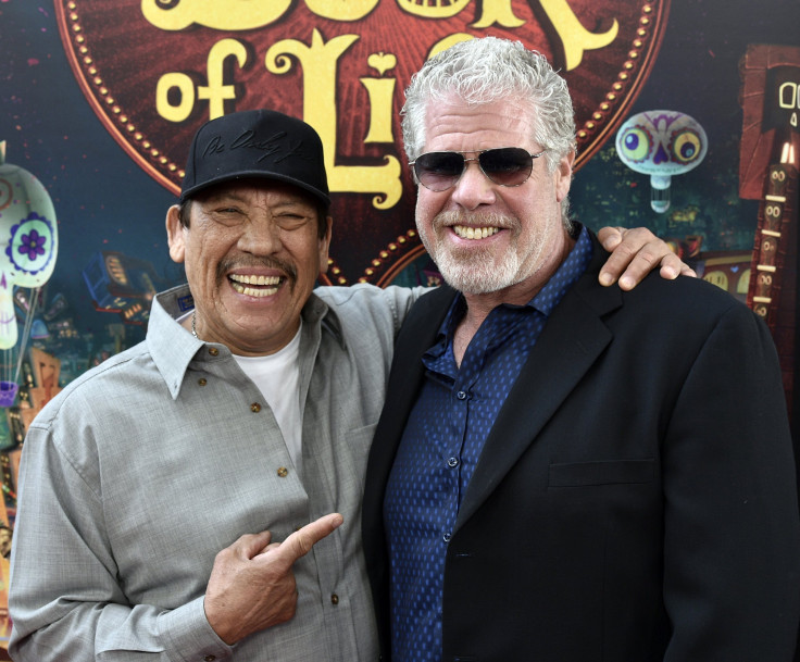 Cast members Danny Trejo (L) and Ron Perlman pose during the premiere of the film "Book of Life" in Los Angeles