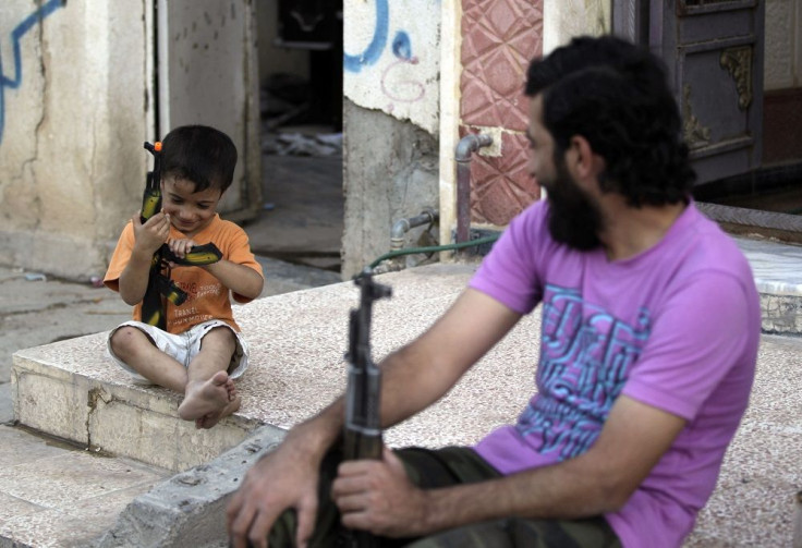 Boy Playing With Toy Gun