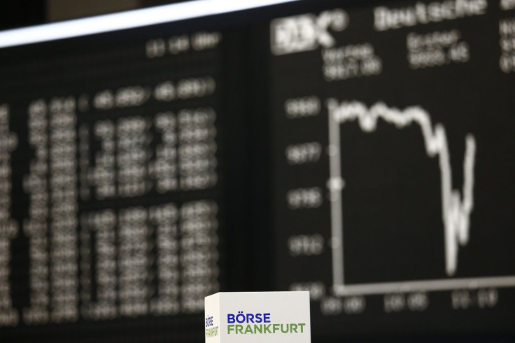 A box with text 'Frankfurt stock exchange' is pictured in front of the German share price index DAX board at the Frankfurt stock exchange, January 15, 2015.