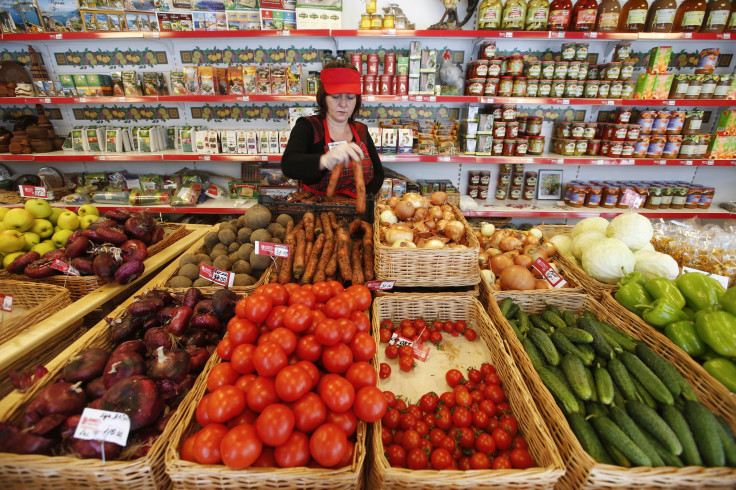 An employee places vegetables at Crimean Farmstead, Russia's first specialized grocery which sells products from Crimea, in the Moscow suburb of Khimki January 25, 2015. 
