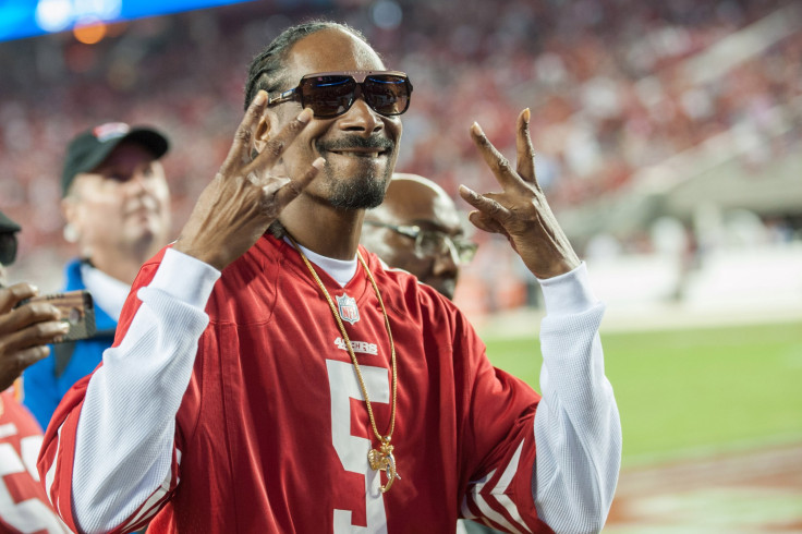 Music artist Snoop Dogg reacts to the crowd after performing during the halftime show at Levi's Stadium. 