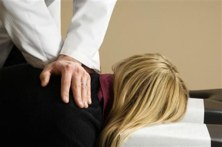 Chiropractor Tries to Curb Low Back Pain