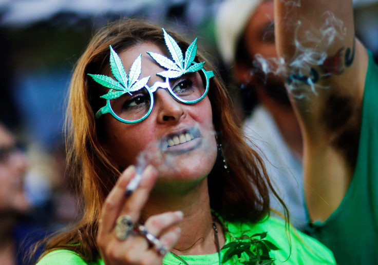 A woman smokes marijuana