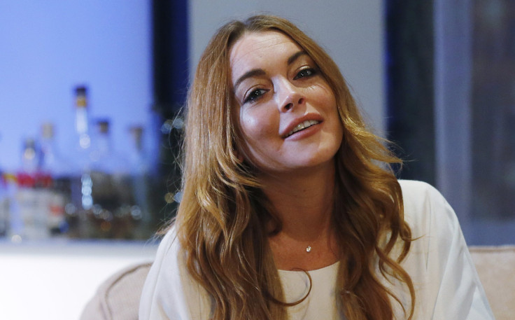 Actress Lindsay Lohan rehearses a scene from "Speed-the-Plow" by David Mamet at the Playhouse Theatre in London