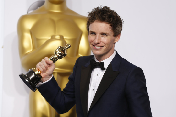 Eddie Redmayne poses with his Oscar for best actor nominee for his role in "The Theory of Everything"