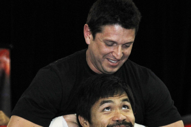 Manny Pacquiao warms up with conditioning coach Alex Ariza in 2010 