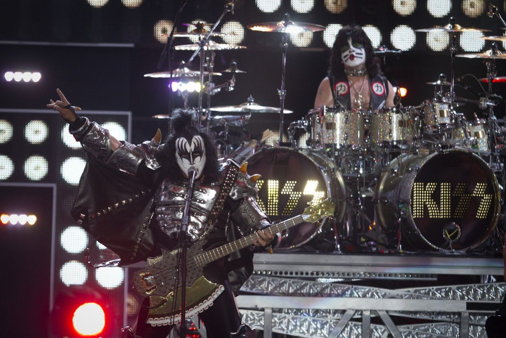 Gene Simmons (L) and Eric Singer of the band Kiss perform during the "Fashion Rocks 2014" concert in the Brooklyn borough of New York September 9, 2014.