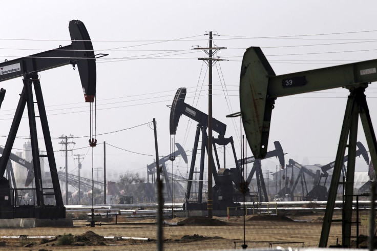 Oil drills are pictured in the Kern River oil field in Bakersfield, California November 9, 2014.