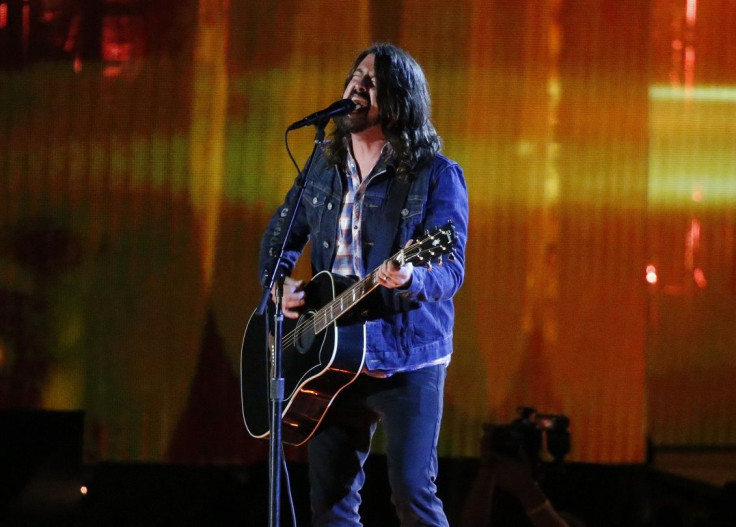 Musician Dave Grohl performs during the Concert for Valor on the National Mall on Veterans' Day in Washington, November 11, 2014.