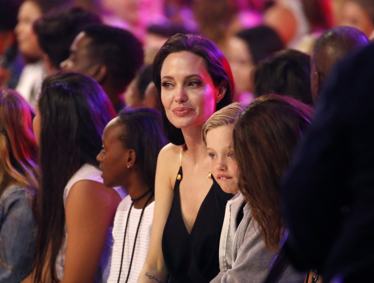 [9:50] Actress Angelina Jolie and her daughters Vivienne (L) and Shiloh (R) attend the 2015 Kids' Choice Awards