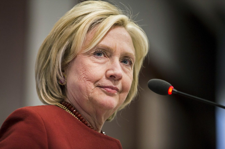 Former U.S. Secretary of State Hillary Clinton delivers remarks during the 2015 Toner Prize for Excellence in Political Reporting award in Washington March 23, 2015.