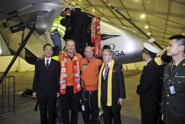 Solar Impulse's pilots Bertrand Piccard and Andre Boschberg at  Chongqing Jiangbei international airport