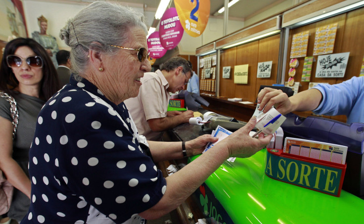 People queue to submit their Euromillions lottery tickets 