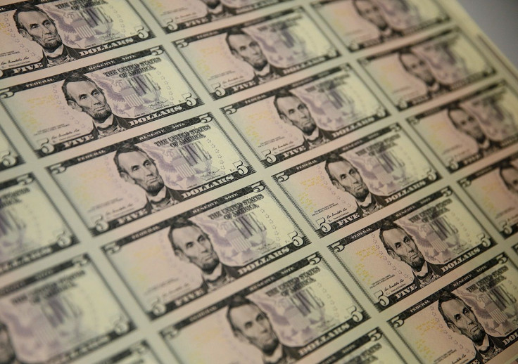 Uncut sheets of former U.S. President Abraham Lincoln on the five-dollar bill currency are seen at the Bureau of Engraving and Printing in Washington March 26, 2015.