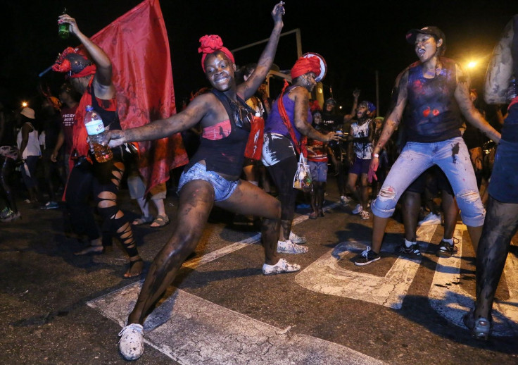 Revellers party during the annual J'Ouvert celebrations in Port-of-Spain March 3, 2014.