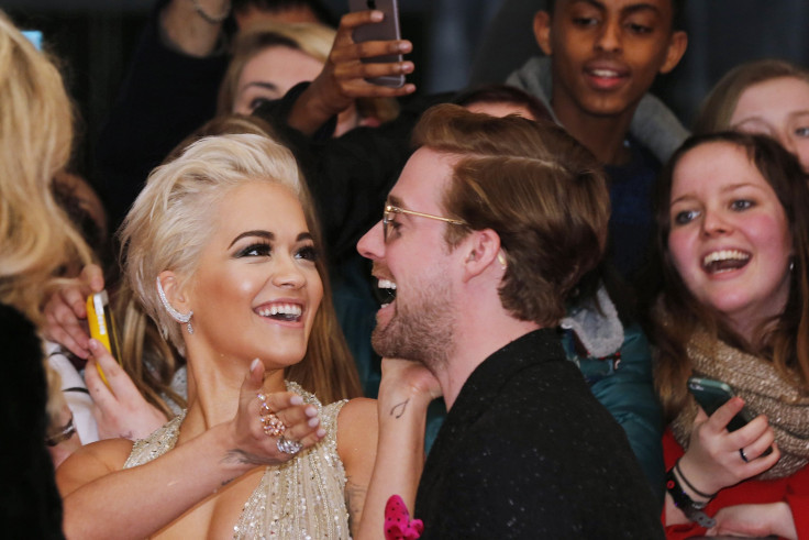 IN PHOTO: Singers Rita Ora and Ricky Wilson arrive for the BRIT music awards at the O2 Arena in Greenwich, London, February 25, 2015. 
