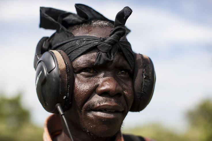 Jackson Locheto from Kenya uses a gold detector in Nanakanak, South Sudan October 23, 2012.