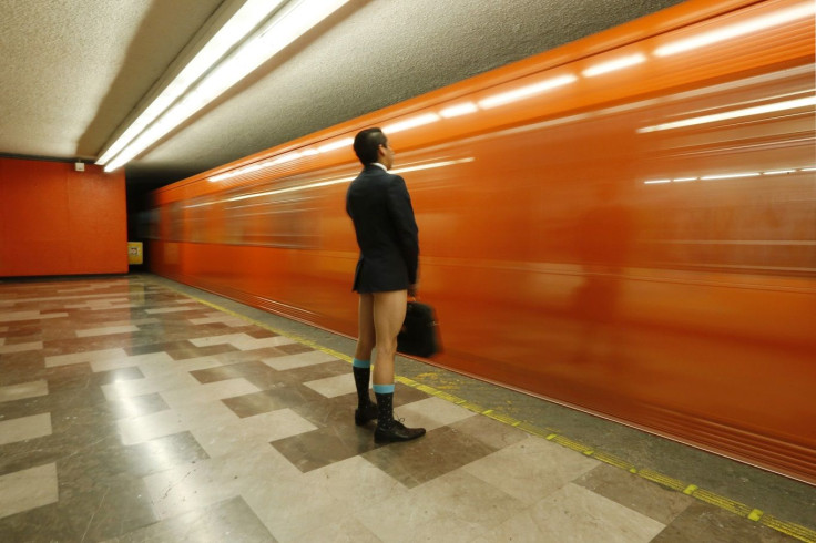 A passenger without pants waits for the subway train during "The No Pants Subway Ride" in Mexico City January 11, 2015.