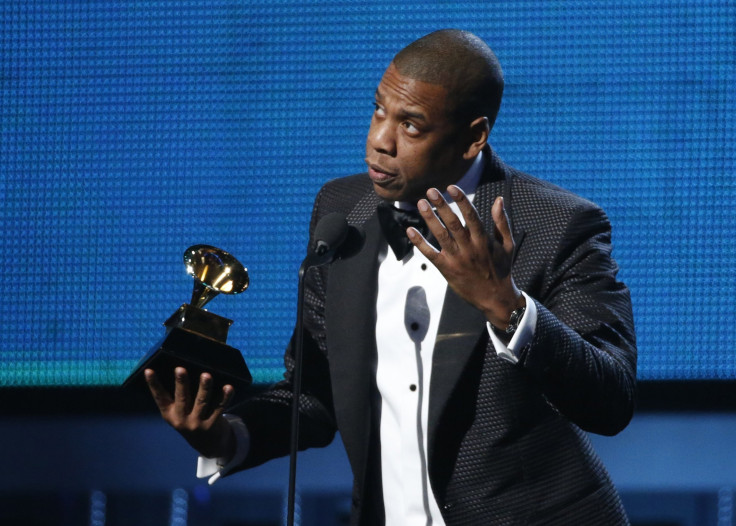 IN PHOTO: Jay-Z accepts the award for Best Rap Song for "Holy Grail" at the 56th annual Grammy Awards in Los Angeles, California January 26, 2014. 