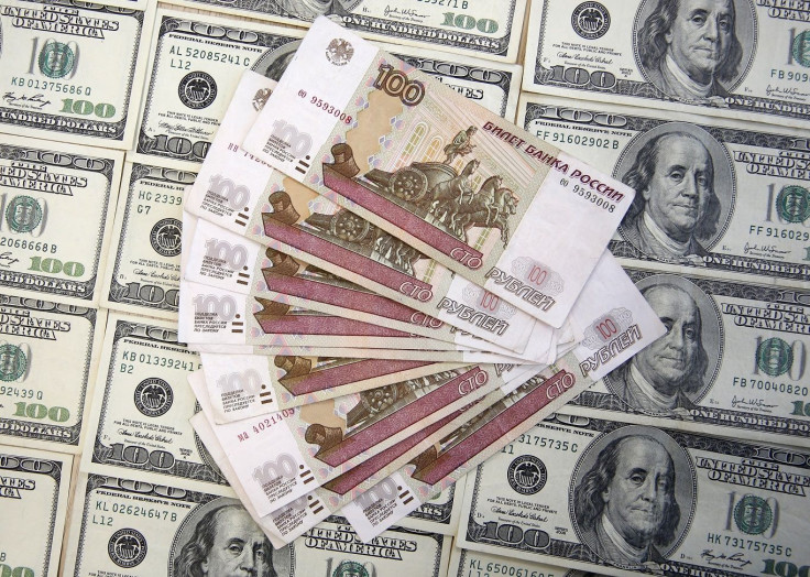 A picture illustration shows U.S. Dollar and Russian Ruble banknotes in Sarajevo, March 9, 2015.