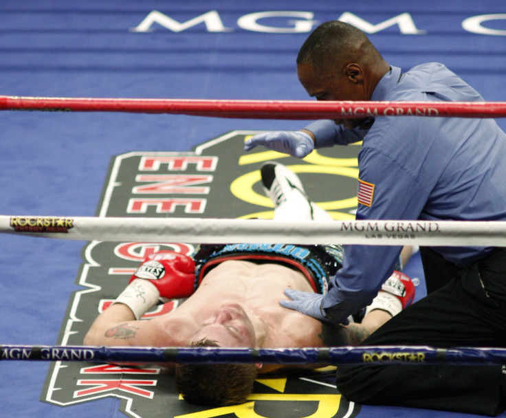 Ricky Hatton of Britain is counted down by referee Kenny Bayless