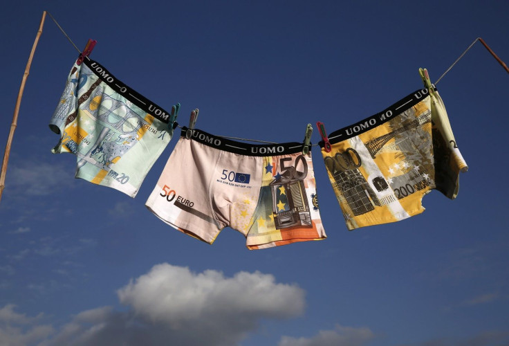 Underwear printed with images of euro banknotes are seen on a washing line, in this picture illustration taken in Athens November 9, 2014.