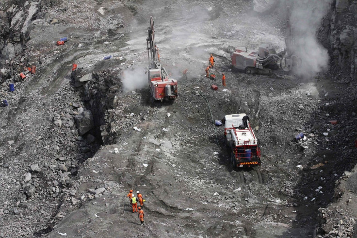 Heavy equipment is used in the 'No. 1 Pipe' at Koidu Holdings' kimberlite diamond mine in eastern Sierra Leone, March 2, 2012.