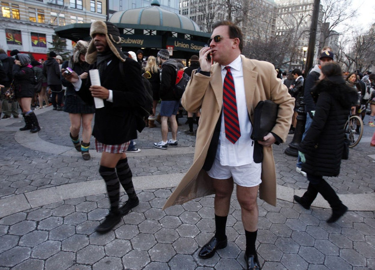 A man talks on his cell phone after taking part in the 10th Annual No Pants Subway Ride in New York City January 9, 2011.