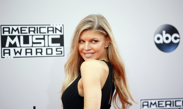 [8:40] Singer Fergie arrives at the 42nd American Music Awards in Los Angeles