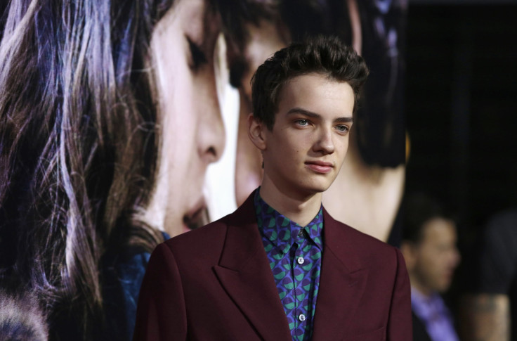 Cast member Kodi Smit-McPhee poses at the premiere of "Romeo and Juliet" in Los Angeles, California September 24, 2013. The movie opens in limited release in the U.S. on October 11. 