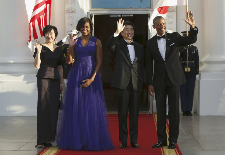 [7:35]  U.S. President Barack Obama (R) and first lady Michelle Obama (2nd L) welcome Japan's Prime Minister Shinzo Abe (2nd R) and his wife Akie Abe (L) for a State Dinner