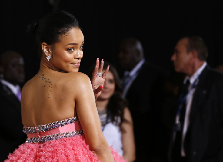 [7:15] Singer Rihanna arrives at the 57th annual Grammy Awards in Los Angeles