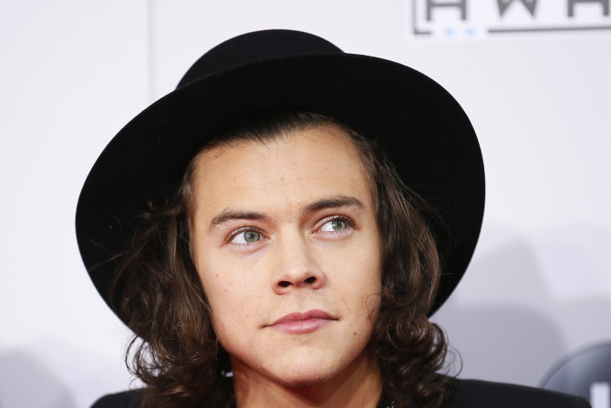 Harry Styles of One Direction arrives at the 42nd American Music Awards in Los Angeles, California November 23, 2014. 
