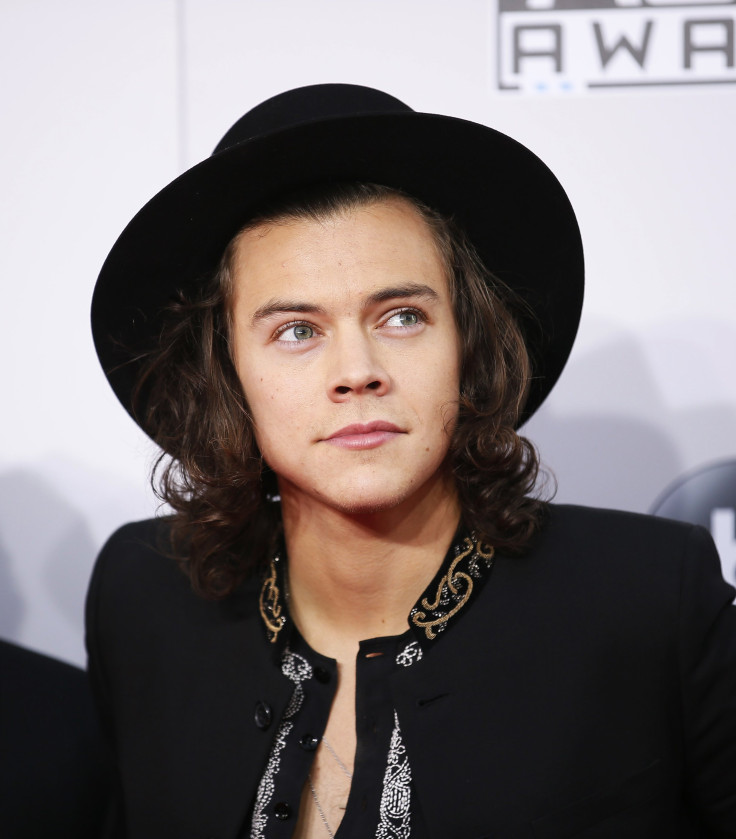 Harry Styles of One Direction arrives at the 42nd American Music Awards in Los Angeles, California November 23, 2014. 