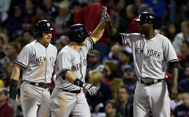 Brett Gardner celebrates a home run with teammates.