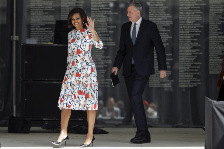 [6:43] U.S. first lady Michelle Obama waves to the guests while she arrives next to New York City Mayor Bill de Blasio to attend the Whitney Museum of American Art Dedication Ceremony