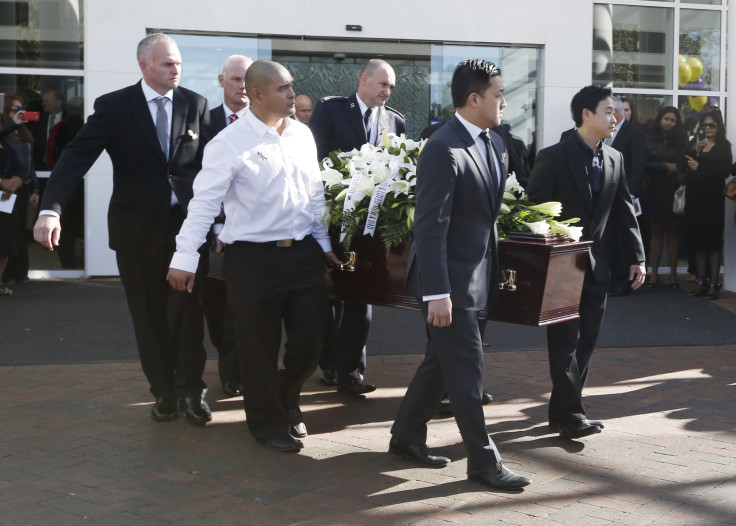  Michael Chan (2nd L), brother of executed Australian drug trafficker Andrew Chan carries Andrew's coffin