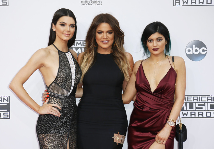 Kendall Jenner, Khloe Kardashian and Kylie Jenner arrive at the 42nd American Music Awards in Los Angeles, California November 23, 2014.