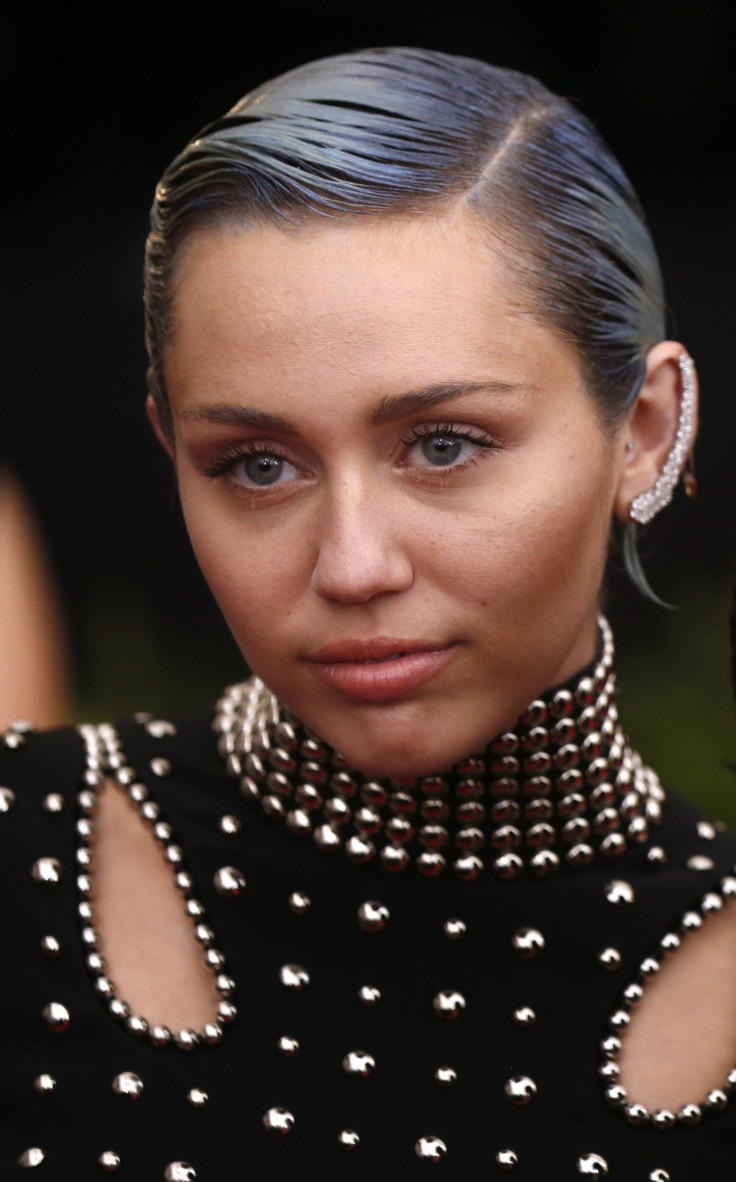 IN PHOTO: Miley Cyrus arrives at the Metropolitan Museum of Art Costume Institute Gala 2015 celebrating the opening of "China: Through the Looking Glass," in Manhattan, New York May 4, 2015. 