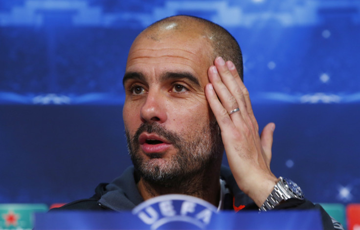 Pep Guardiola speaks at a press conference.