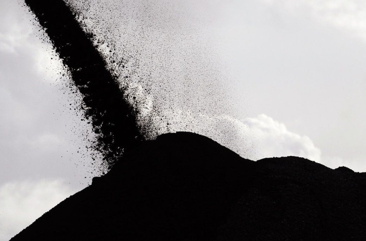 Coal falls from a stacker/reclaimer to a stockpile at the coal port in Newcastle June 6, 2012.