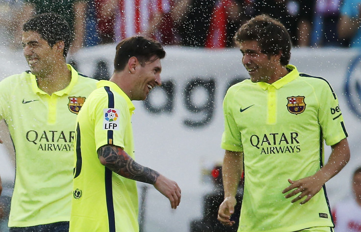 Lionel Messi, Suarez and Neymar celebrating the La Liga title win.