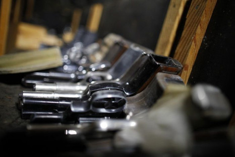Handguns, recently seized by police on the streets of Yemen's capital Sanaa