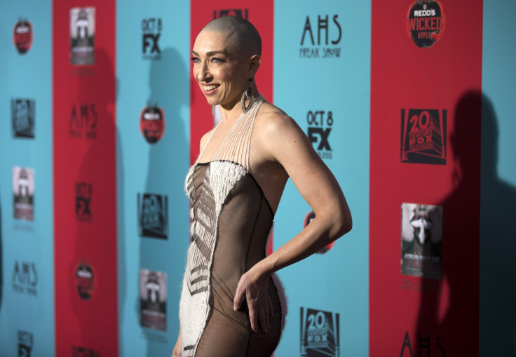 Cast member Naomi Grossman poses at the premiere of "American Horror Story: Freak Show" in Hollywood, California October 5, 2014