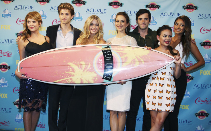IN PHOTO: Cast members of the TV series "Pretty Little Liars"  pose after winning the Choice Drama TV show award at the Teen Choice Awards at the Gibson amphitheatre in Universal City, California August 11, 2013.  