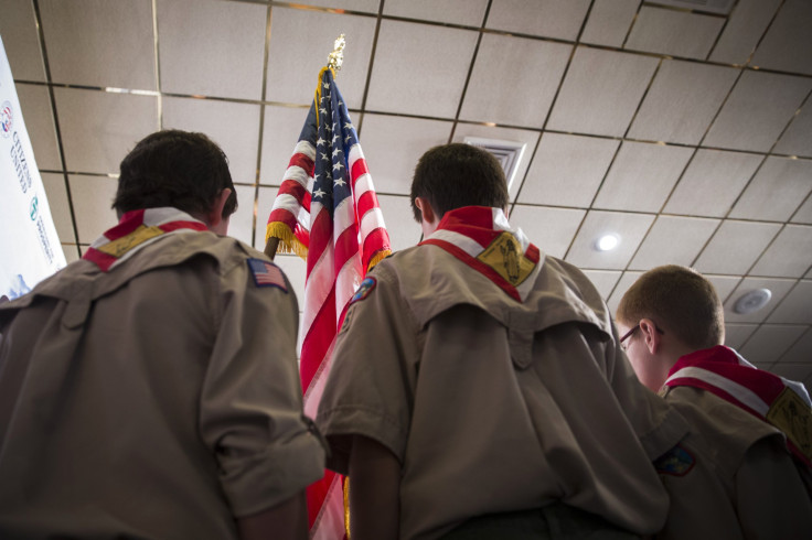 IN PHOTO: Boy Scouts stand on stage with a U.S. flag during the Pledge of Allegiance to begin the inaugural Freedom Summit meeting for conservative speakers in Manchester, New Hampshire April 12, 2014.